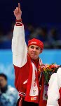 Canada's Eric Bedard celebrates after winning the  or bronze medal in the short track Speed skating event at the 1998 Nagano Olympic Games. (CP Photo/ COA)