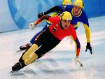 Canada's Francois Drolet (left) competes in the short track speed skating event at the 1998 Nagano Winter Olympic Games. (CP Photo/ COA/ Scott Grant)