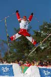 Deidre Dionne of Red Deer flies over the huge crowd at Deer Valley, Utah, to qualify fifth for Monday's aerials final at the Winter Olympics, Sat., Feb. 16, 2002.  (CP PHOTO/COA/Mike Ridewood)