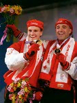 Canada's Dave MacEachern and Pierre Lueders wave to a crowd of on lookers at the 1998 Nagano Winter Olympics. (CP PHOTO/COA)