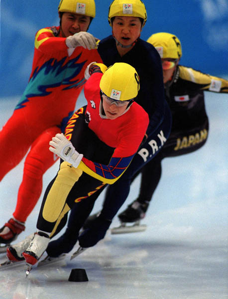 Canada's Annie Perreault in action against her opponents at the 1998 Nagano Winter Olympics. (CP PHOTO/COA)