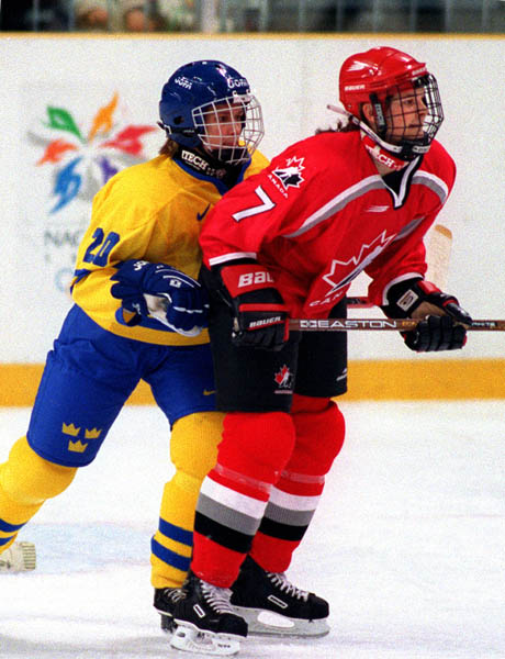 Canada's Jennifer Botterill in action against her opponent at the 1998 Nagano Winter Olympics. (CP PHOTO/COA)