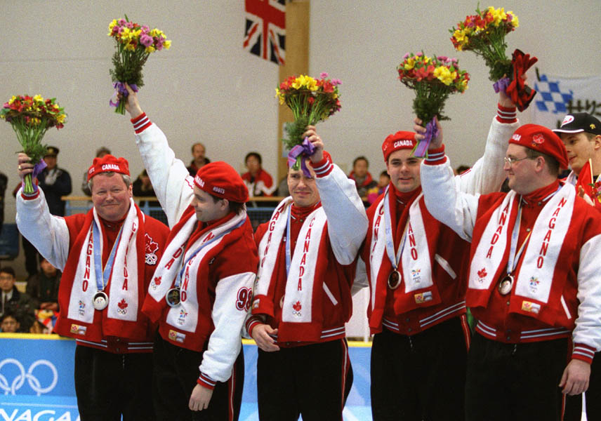Canada's men's curling team from left to right; Paul Savage, George Karrys, Collin Mitchell, Richard Hart, Mike Harris at the 1998 Nagano Winter Olympics. (CP PHOTO/COA)