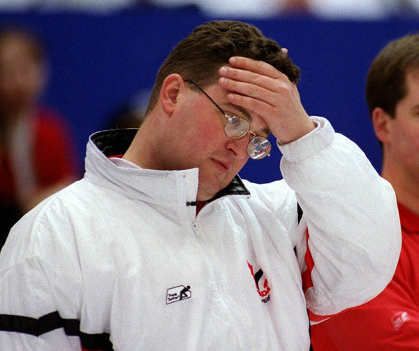 Canada's Mike Harris curling at the 1998 Nagano Winter Olympics. (CP PHOTO/COA)
