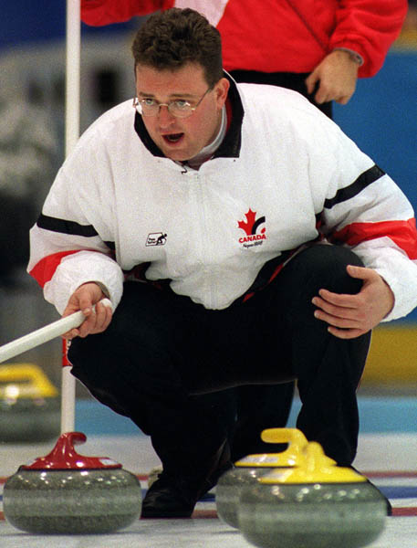 Canada's Mike Harris yells instructions at his team mates at the 1998 Nagano Winter Olympics. (CP PHOTO/COA)