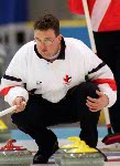 Mike Harris du Canada participe  l'preuve de curling aux Jeux olympiques d'hiver de Nagano de 1998.  (PC Photo/AOC)