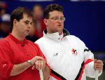 Canada's Collin Mitchell and Richard Hart curling at the 1998 Nagano Winter Olympics. (CP PHOTO/COA)