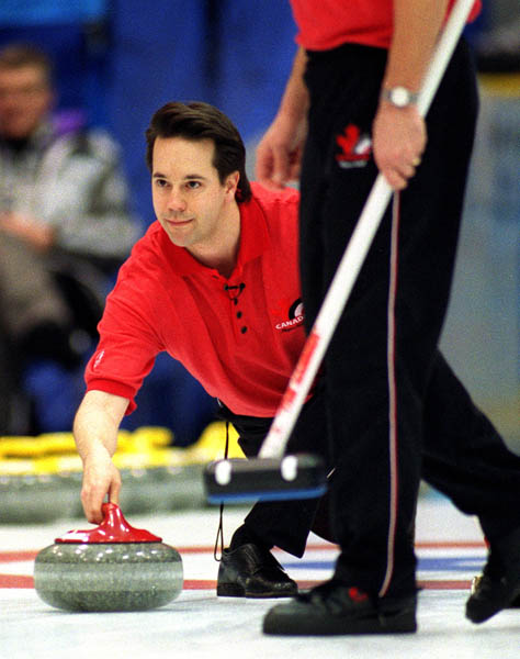 Canada's George Karrys curling at the 1998 Nagano Winter Olympics. (CP PHOTO/COA)