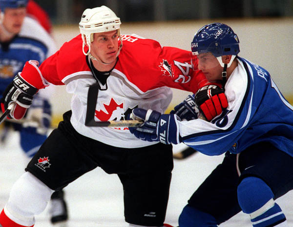 Canada's Chris Pronger in action against his opponent at the 1998 Nagano Winter Olympics. (CP PHOTO/COA)