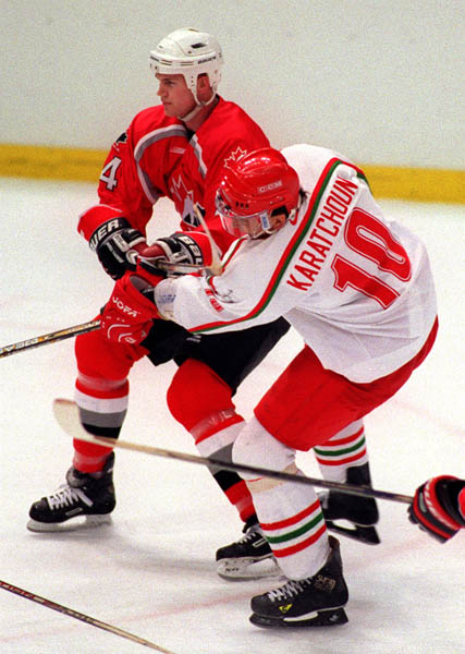 Canada's Chris Pronger in action against his opponent  at the 1998 Nagano Winter Olympics. (CP PHOTO/COA)