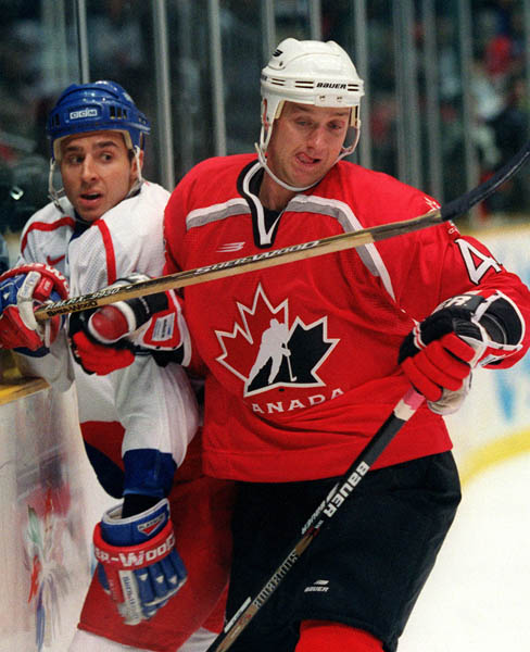 Canada's Rob Blake in action against his opponent at the 1998 Nagano Winter Olympics.