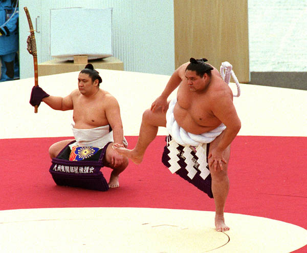 Sumo wrestlers perform during the opening ceremony at the 1998 Nagano Winter Olympics. (CP PHOTO/COA)
