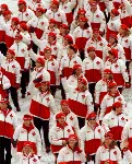Canada's Jean-Luc Brassard carries the flag as the Canadian team participates in the opening ceremony at the 1998 Nagano Olympic Games. (CP Photo/ COA)