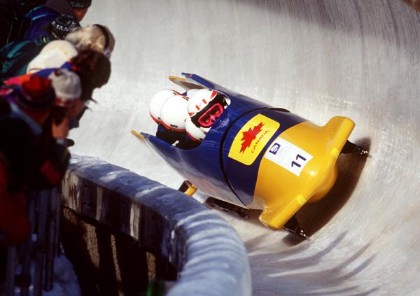 Canada's Pierre Lueders, Dave MacEachern, Jack Pyk and Pascal Caron compete in the four man bobsleigh event at the 1994 Lillehammer Winter Olympics. (CP PHOTO/ COA)