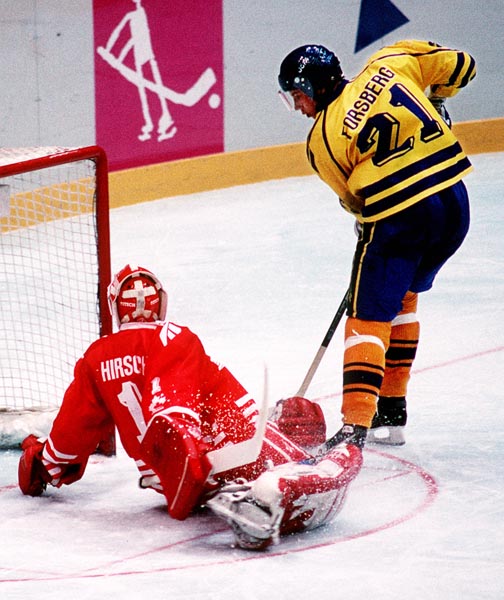 Canada's Corey Hirsch and Peter Forsberg in action during the gold medal game which Sweden won 3-2 in a shoot out at the 1994 Lillehammer Winter Olympics. (CP PHOTO/ COA)