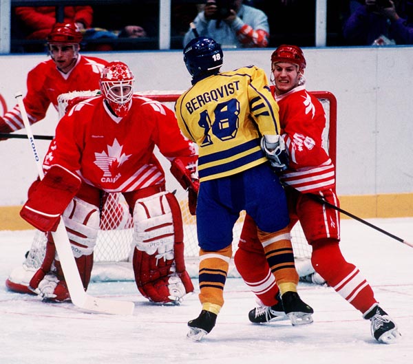 Canada's Corey Hirsch and Fabian Joseph in action during the gold medal game which Sweden won 3-2 in a shoot out at the 1994 Lillehammer Winter Olympics. (CP PHOTO/ COA)