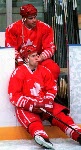 (From left to right) Canada's Adrian Aucoin, Dwayne Norris and Todd Hlushko celebrate during hockey action against Sweden at the 1994 Winter Olympics in Lillehammer. (CP Photo/COA/Claus Andersen)