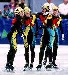 Canada's women's short track relay team, Isabelle Charest, Sylvie Daigle, Christine Boudrias and Nathalie Lambert, celebrates its silver medal win at the 1994 Lillehammer Winter Olympics. (CP Photo/COA/F. Scott Grant)