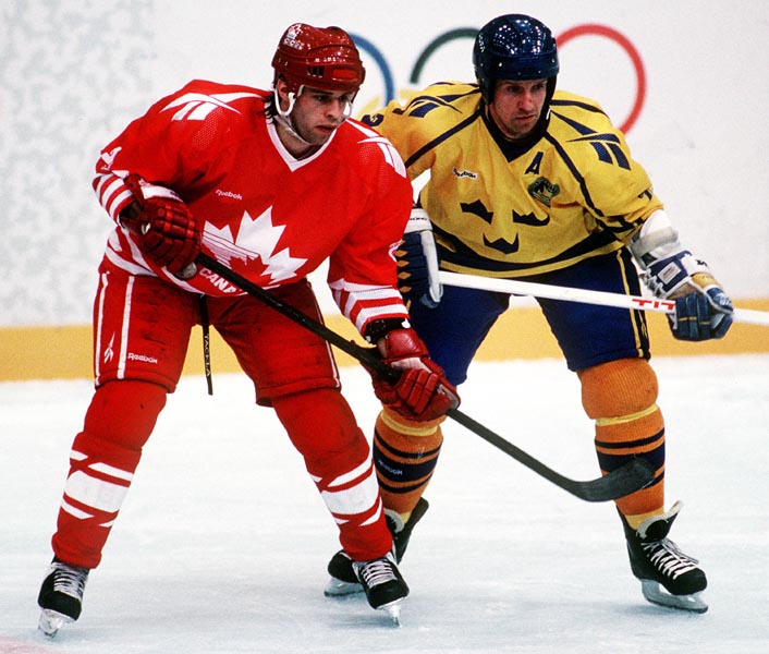 Canada's Mark Astley in action against Sweden at the 1994 Lillehammer Winter Olympics. (CP PHOTO/COA)