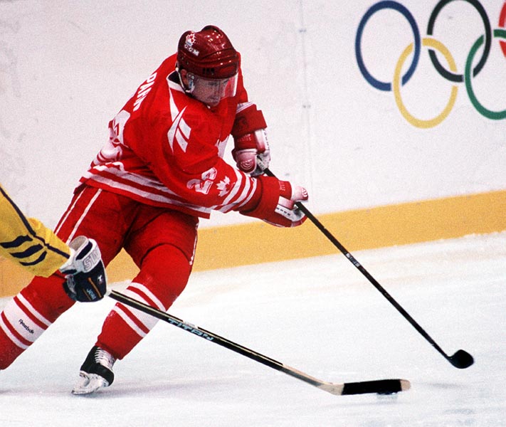 Canada's Greg Parks in action against Sweden at the 1994 Lillehammer Winter Olympics. (CP PHOTO/ COA)