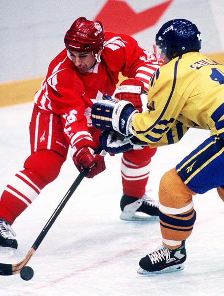 Canada's Wally Schreiber in action against Sweden at the 1994 Lillehammer Winter Olympics. (CP PHOTO/ COA)