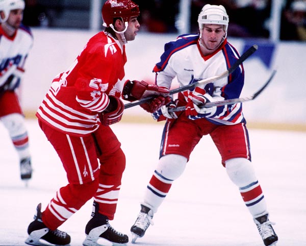 Canada's Mark Astley in action against the U.S.A. at the 1994 Lillehammer Winter Olympics. (CP PHOTO/ COA)