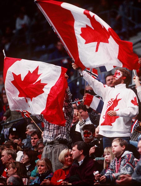 Canadian fans show their support during a hockey game at the 1994 Lillehammer Winter Olympics. (CP PHOTO/COA)