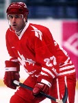Canada's Chris Kontos competing in the Gold Medal game against the Unified Team in which Canada won Silver at the 1992 Albertville Olympic winter Games. (CP PHOTO/COA/Scott Grant)