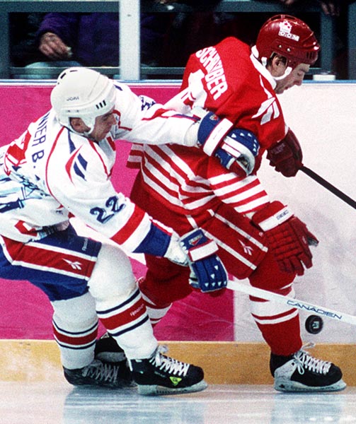 Canada's Wally Schreiber in action against France at the 1994 Lillehammer Winter Olympics. (CP PHOTO/ COA)