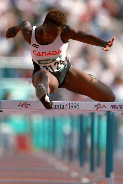 Canada's Katie Anderson competing in the 100m hurdles event at the 1996 Atlanta Summer Olympic Games.(CP PHOTO/COA/Claus Andersen)