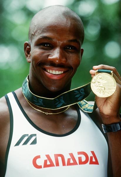 Canada's Donovan Bailey with the gold medal he won for the men's 100m event at the 1996 Atlanta Summer Olympic Games.
