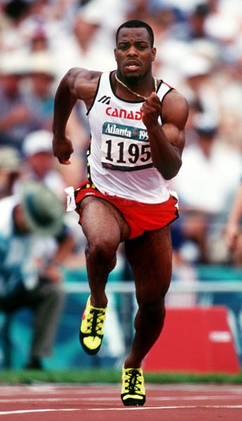 Canada's Carlton Chambers competing in the 100m event at the 1996 Atlanta Summer Olympic Games.(CP PHOTO/COA/Claus Andersen)