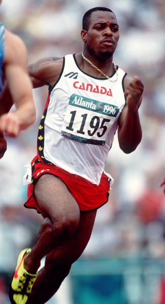 Canada's Carlton Chambers competing in the 100m event at the 1996 Atlanta Summer Olympic Games.(CP PHOTO/COA/Claus Andersen)
