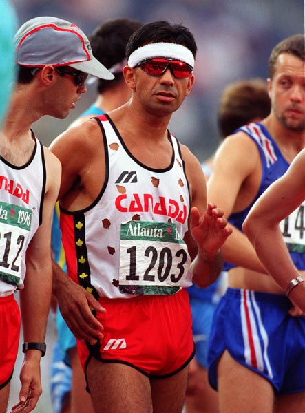 Canada's Arturo Huerta (centre) at the 1996 Atlanta Summer Olympic Games.(CP PHOTO/COA/Claus Andersen)
