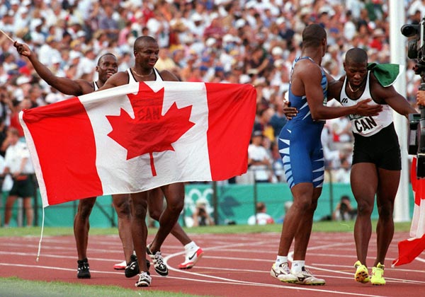 Canada's men's 4x100m relay team left to right Bruny Surin, Donovan Bailey, Robert Esmie and Glenroy Gilbert at the 1996 Atlanta Summer Olympic Games.(CP PHOTO/COA/Claus Andersen)