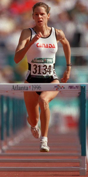 Canada's Sonia Paquette competing in the hurdles event at the 1996 Atlanta Summer Olympic Games.(CP PHOTO/COA/Claus Andersen)