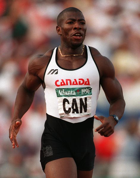 Canada's Glenroy Gilbert competing in the men's 4x100m relay at the 1996 Atlanta Summer Olympic Games.(CP PHOTO/COA/Claus Andersen)