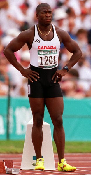 Canada's Glenroy Gilbert competing in the men's 100m event at the 1996 Atlanta Summer Olympic Games.(CP PHOTO/COA/Claus Andersen)