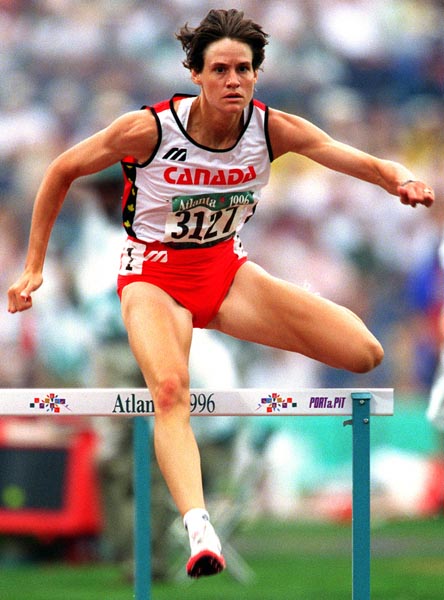 Canada's Catherine Bond-Mills competing in the heptathlon event at the 1996 Atlanta Summer Olympic Games. (CP PHOTO/COA/Claus Andersen)