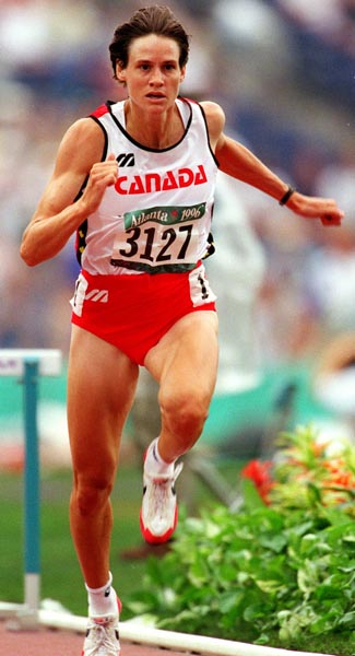 Canada's Catherine Bond-Mills competing in the heptathlon event at the 1996 Atlanta Summer Olympic Games. (CP PHOTO/COA/Claus Andersen)