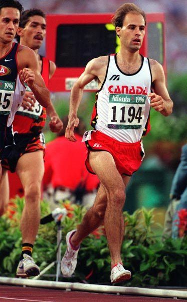 Canada's Joel Bourgeois competing in the 3000m steeplechase event at the 1996 Atlanta Summer Olympic Games. (CP PHOTO/COA/Claus Andersen)