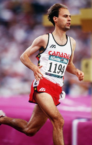 Canada's Joel Bourgeois competing in the 3000m steeplechase event at the 1996 Atlanta Summer Olympic Games. (CP PHOTO/COA/Claus Andersen)