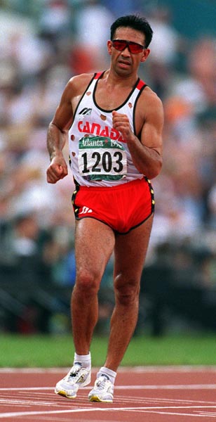 Canada's Arturo Huerta competing in the speed walking event at the 1996 Atlanta Summer Olympic Games. (CP PHOTO/COA/Claus Andersen)