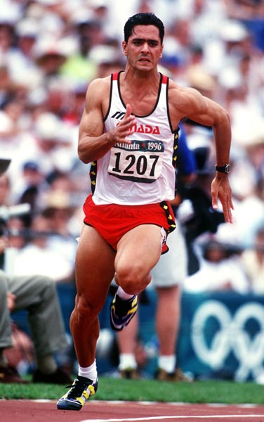 Canada's Peter Ogilvie competing in the 200m event at the 1996 Atlanta Summer Olympic Games. (CP PHOTO/COA/Claus Andersen)