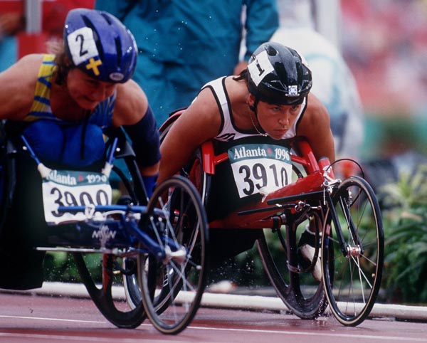Canada's Chantal Petitclerc (right) competing in the 800m wheelchair event at the 1996 Atlanta Summer Olympic Games. (CP PHOTO/COA/Claus Andersen)