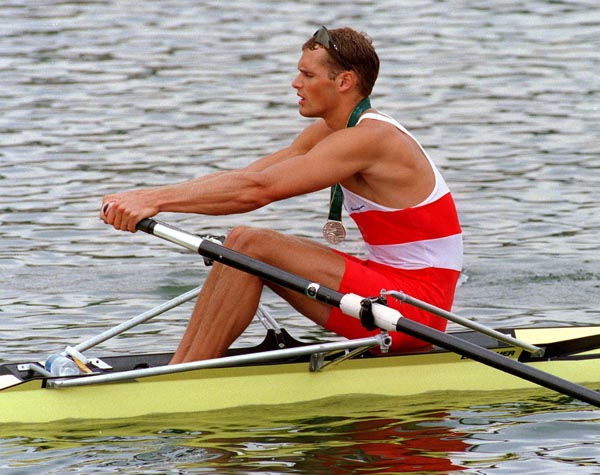 Canada's Derek Porter wears the silver medal he won for men's 1x sculls event at the 1996 Atlanta Summer Olympic Games. (CP PHOTO/COA/Mike Ridewood)