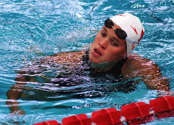 Canada's Lisa Flood competing in the swimming portion at the 1996 Atlanta Summer Olympic Games. (CP PHOTO/COA/Mike Ridewood)