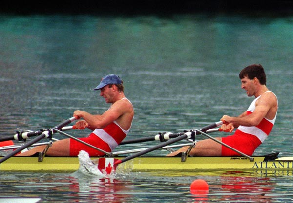 Canada's Todd Hallet (L) and Mike Forgeron competing in the men's 2x sculls at the 1996 Atlanta Summer Olympic Games. (CP PHOTO/COA/Mike RIdewood)