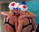 Canada's Andrea Moody (left), Claire Howard (right) and Shannon Shakespeare (centre) at the 1996 Atlanta Summer Olympic Games. (CP PHOTO/COA/Claus Andersen)