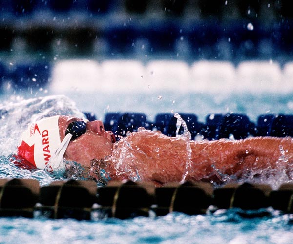 Canada's Julie Howard doing the backstroke for the swimming event at the 1996 Atlanta Summer Olympic Games. (CP PHOTO/COA/Claus Andersen)